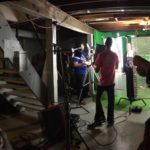 the makeshift studio, setup in director Adam Orton's basement